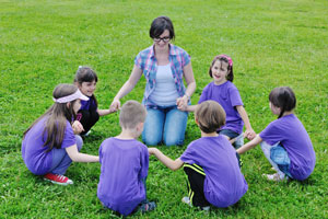 teacher outside with students