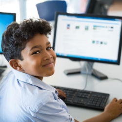 Clipart Computer Teacher Supervising A School Boy - Royalty Free