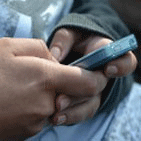 hands and cell phone